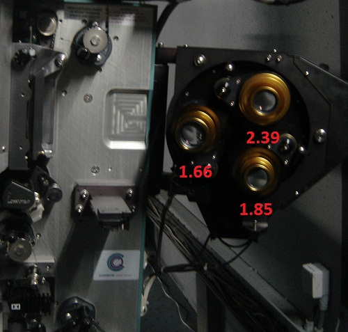 Photo of 3 lenses on Christie Film Projector